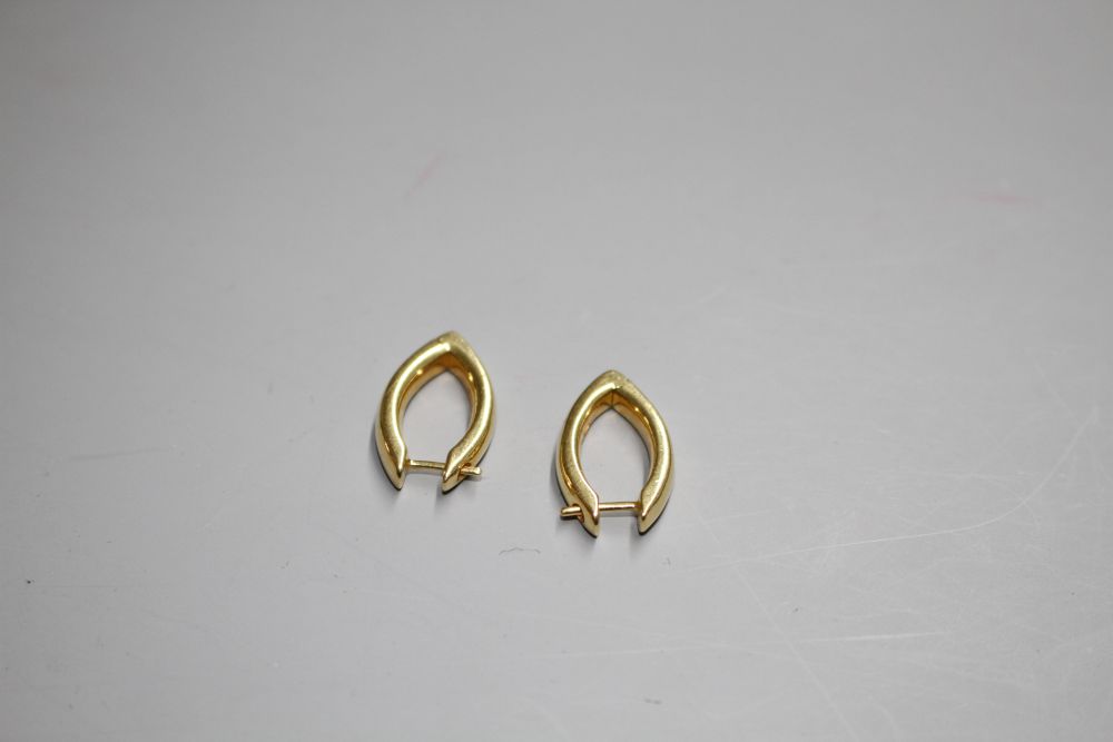 A pair of 20th century Italian 750 yellow metal Pomellato navette shaped earring,